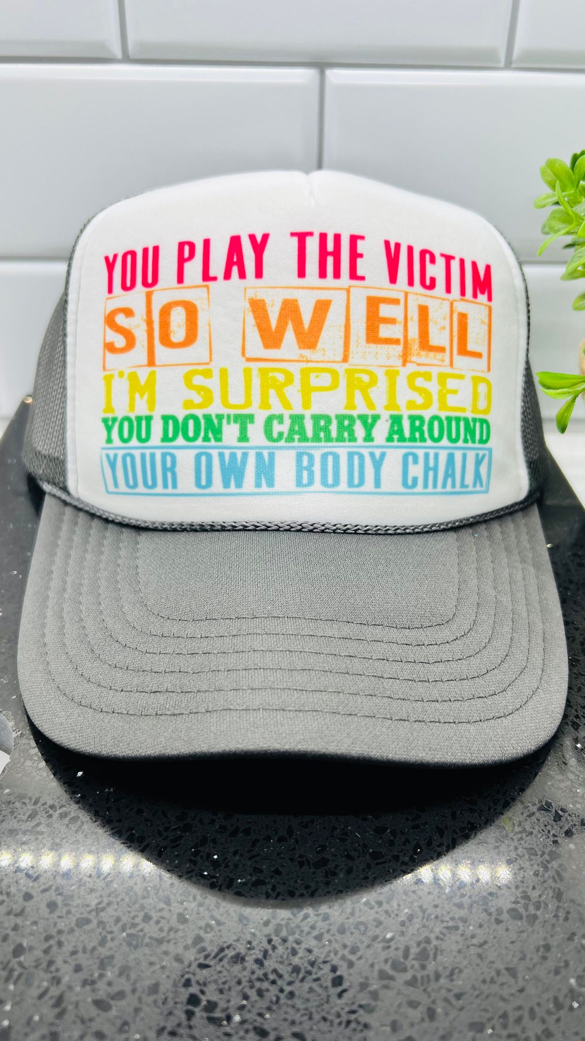 You Play the Victim So Well Trucker Hat